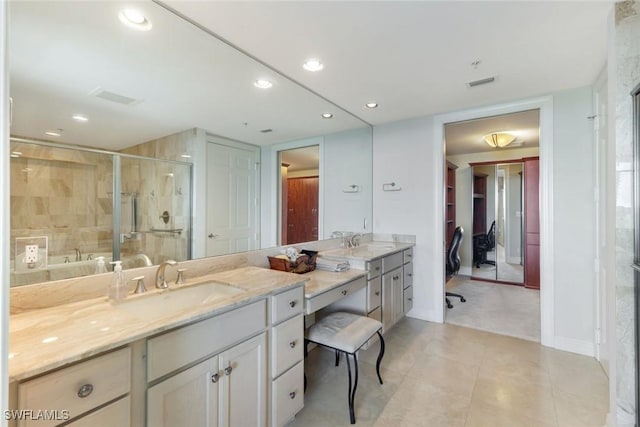 275 Indies Way Unit 1001, Naples, FL 34110 - full bathroom featuring vanity, a shower stall, tile patterned floors, and recessed lighting