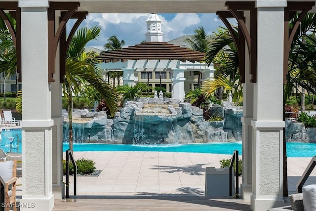 275 Indies Way Unit 1001, Naples, FL 34110 - view of community pool