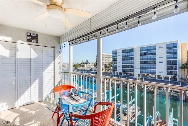 4531 Bay Beach Ln Unit 337, Fort Myers Beach, FL 33931 - sunroom / solarium featuring a water view
