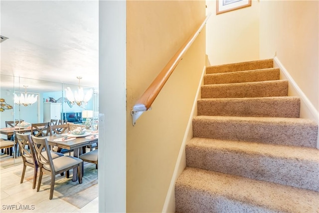 4531 Bay Beach Ln Unit 337, Fort Myers Beach, FL 33931 - stairway with a chandelier