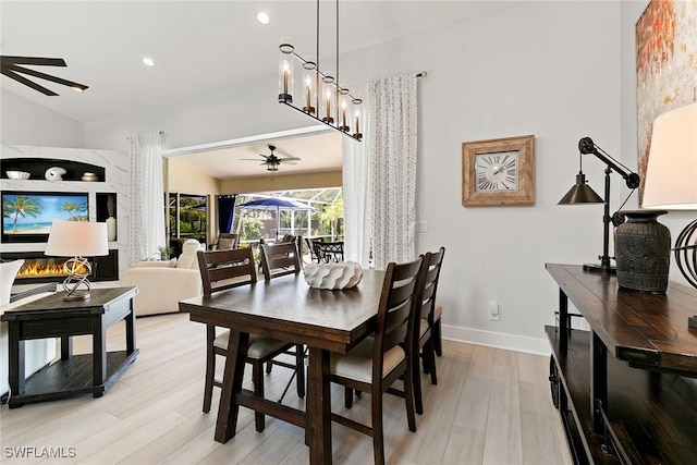 2322 River Reach Dr, Naples, FL 34104 - dining room with ceiling fan, light wood-style flooring, recessed lighting, and vaulted ceiling