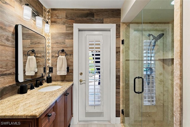 2322 River Reach Dr, Naples, FL 34104 - bathroom with vanity and a shower stall