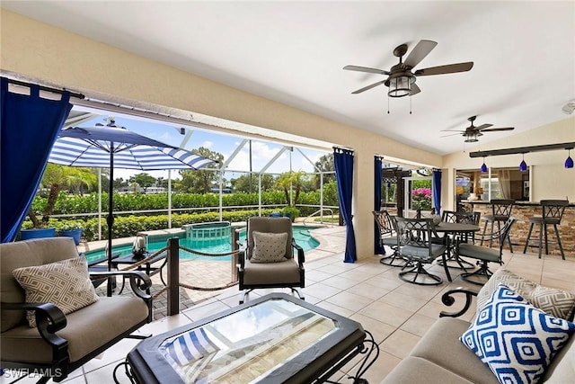 2322 River Reach Dr, Naples, FL 34104 - view of patio featuring a pool with connected hot tub, a ceiling fan, outdoor lounge area, a lanai, and outdoor dining space