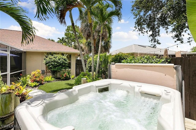 2322 River Reach Dr, Naples, FL 34104 - view of patio featuring a hot tub