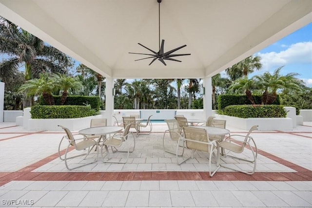 7515 Pelican Bay Blvd Unit 8A, Naples, FL 34108 - view of patio with outdoor dining space and a ceiling fan
