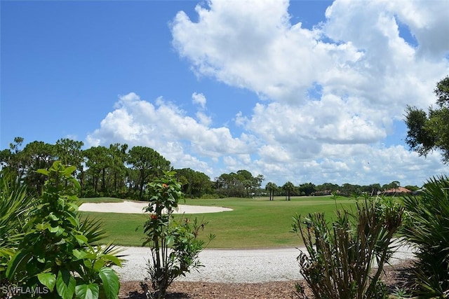 24320 Sandpiper Isle Way Unit 202, Bonita Springs, FL 34134 - view of grassy yard featuring golf course view