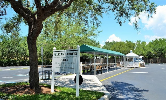 24320 Sandpiper Isle Way Unit 202, Bonita Springs, FL 34134 - view of property's community with a gazebo and uncovered parking