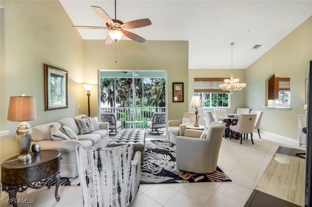 24320 Sandpiper Isle Way Unit 202, Bonita Springs, FL 34134 - living area with a chandelier, high vaulted ceiling, ceiling fan, and light tile patterned flooring