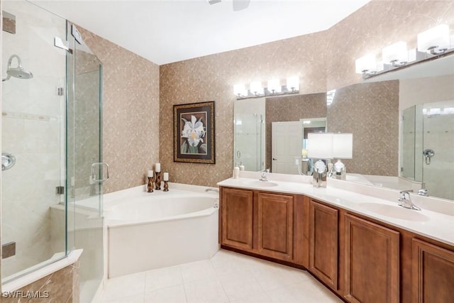 24320 Sandpiper Isle Way Unit 202, Bonita Springs, FL 34134 - full bath with a bath, double vanity, a stall shower, and tile patterned floors