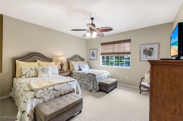 24320 Sandpiper Isle Way Unit 202, Bonita Springs, FL 34134 - bedroom with carpet and ceiling fan