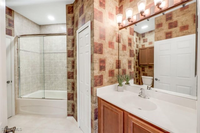 24320 Sandpiper Isle Way Unit 202, Bonita Springs, FL 34134 - full bathroom with wallpapered walls, combined bath / shower with glass door, vanity, and tile patterned floors