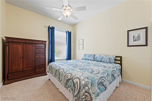 28864 Yellow Fin Trl, Bonita Springs, FL 34135 - bedroom with light colored carpet and a ceiling fan