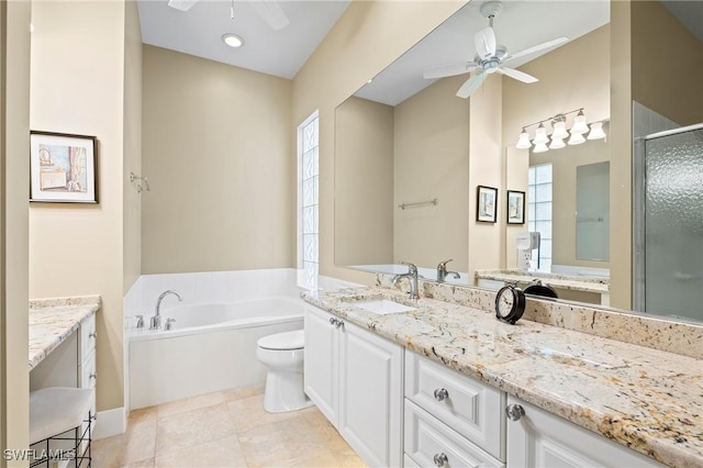 28864 Yellow Fin Trl, Bonita Springs, FL 34135 - full bathroom featuring ceiling fan, vanity, a shower stall, a bath, and tile patterned floors