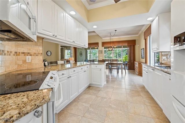 28864 Yellow Fin Trl, Bonita Springs, FL 34135 - kitchen with white appliances, crown molding, white cabinetry, backsplash, and recessed lighting