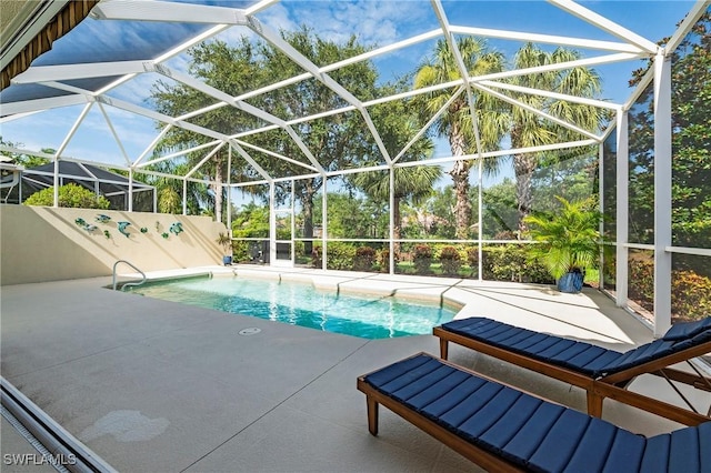 28864 Yellow Fin Trl, Bonita Springs, FL 34135 - outdoor pool with a patio and glass enclosure