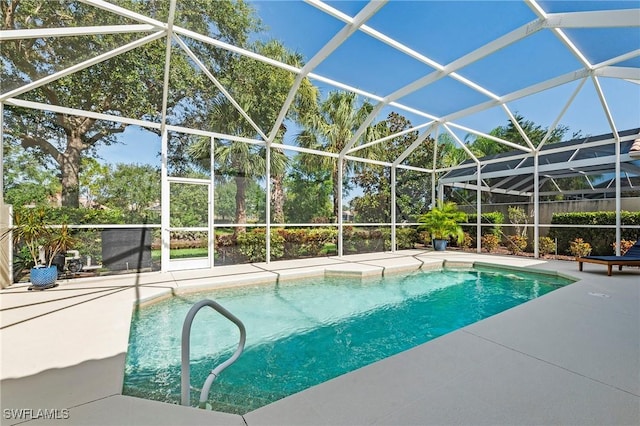 28864 Yellow Fin Trl, Bonita Springs, FL 34135 - view of pool featuring a patio and glass enclosure
