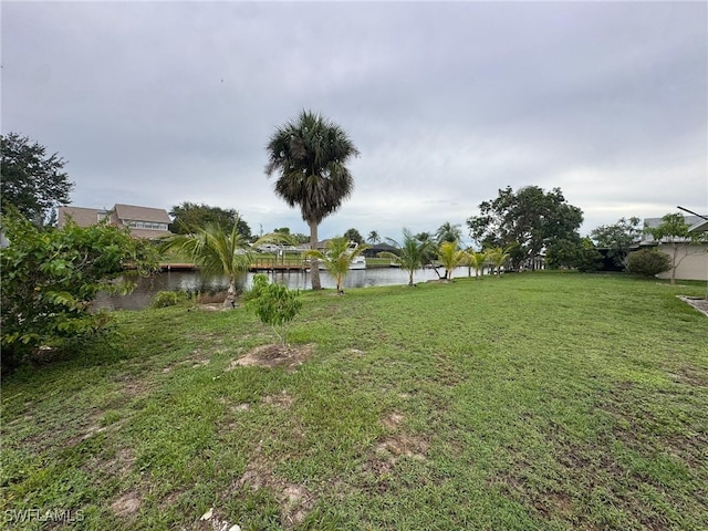 2231 Isle Of Pines Ave, Fort Myers, FL 33905 - view of grassy yard featuring a water view