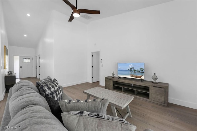 221 Saint James Way, Naples, FL 34104 - living room with high vaulted ceiling, a ceiling fan, wood finished floors, and recessed lighting