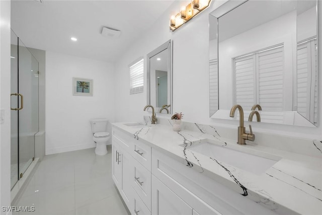 221 Saint James Way, Naples, FL 34104 - full bathroom with double vanity, a stall shower, a closet, and tile patterned floors