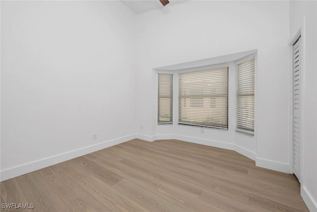 221 Saint James Way, Naples, FL 34104 - empty room featuring light wood-style floors
