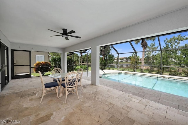 221 Saint James Way, Naples, FL 34104 - outdoor pool featuring a patio, a ceiling fan, and glass enclosure