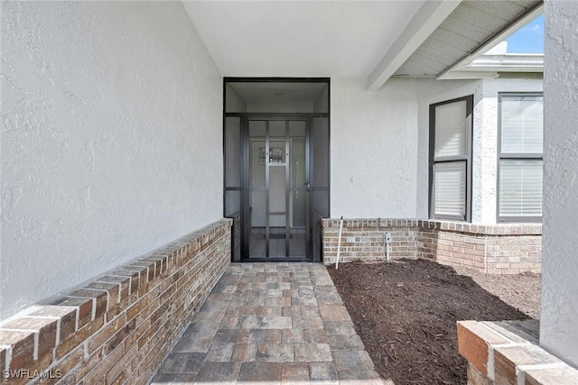 221 Saint James Way, Naples, FL 34104 - doorway to property with stucco siding