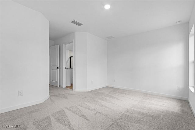735 La Plata Ave, Lehigh Acres, FL 33974 - unfurnished room featuring carpet floors and baseboards