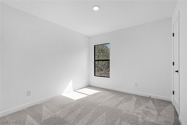 735 La Plata Ave, Lehigh Acres, FL 33974 - empty room featuring carpet flooring and recessed lighting