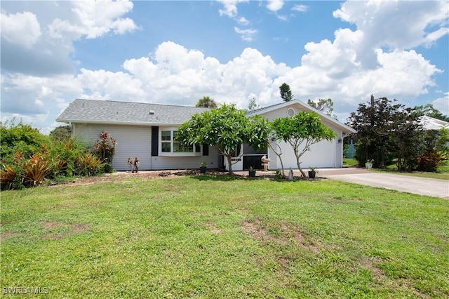 6340 P G A Dr, North Fort Myers, FL 33917 - ranch-style house featuring driveway, a front lawn, and a garage