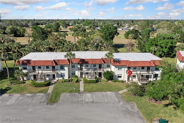 4198 27th Ct SW Unit 105, Naples, FL 34116 - drone / aerial view of a tree filled landscape