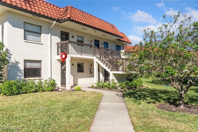 4198 27th Ct SW Unit 105, Naples, FL 34116 - view of building exterior featuring stairway