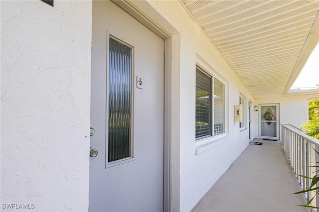 431 Van Buren St Unit B6, Fort Myers, FL 33916 - view of exterior entry featuring stucco siding