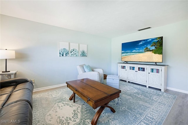 431 Van Buren St Unit B6, Fort Myers, FL 33916 - living area featuring wood finished floors and baseboards