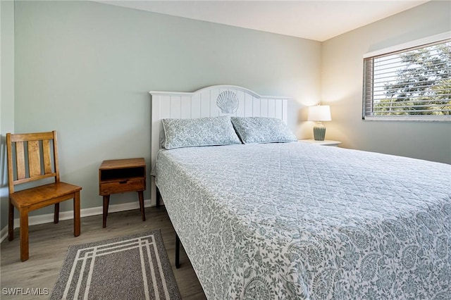431 Van Buren St Unit B6, Fort Myers, FL 33916 - bedroom featuring wood finished floors and baseboards