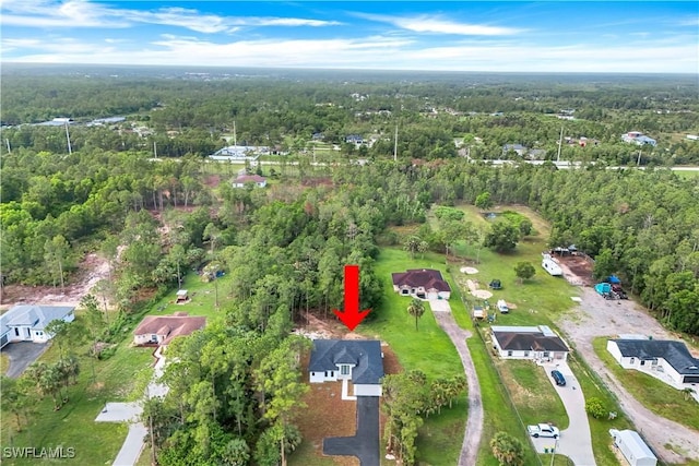 3644 35th Ave NE, Naples, FL 34120 - aerial overview of property's location with a heavily wooded area