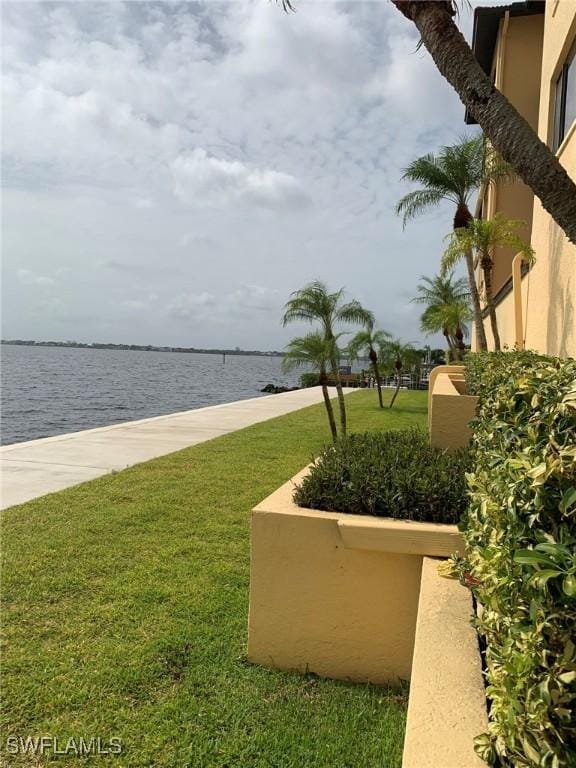 4015 SE 20th Pl Unit 503, Cape Coral, FL 33904 - view of green lawn with a water view