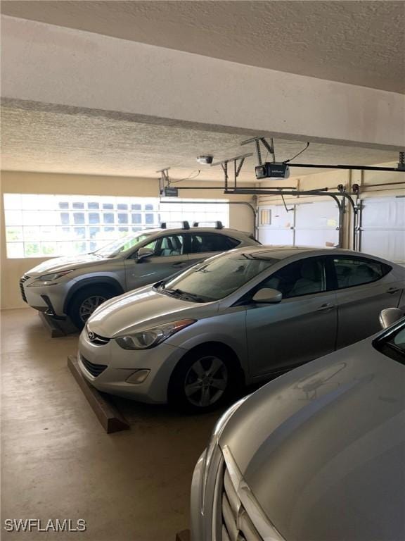4015 SE 20th Pl Unit 503, Cape Coral, FL 33904 - garage featuring a garage door opener