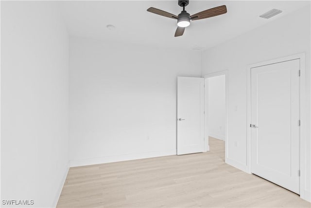1061 Sunrise Blvd, Lehigh Acres, FL 33974 - unfurnished bedroom featuring light wood-style flooring and ceiling fan