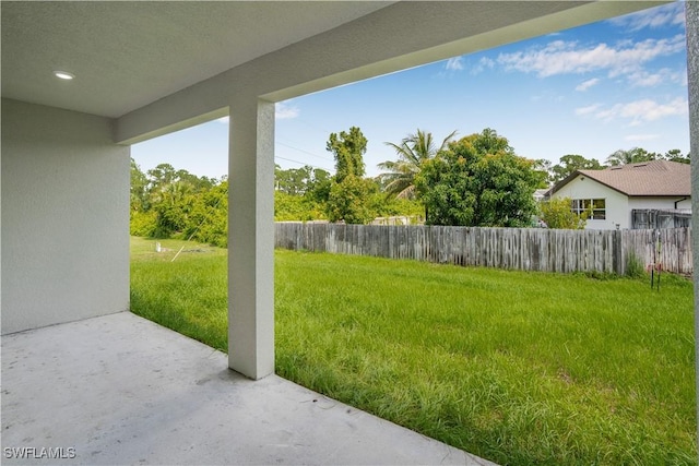 1061 Sunrise Blvd, Lehigh Acres, FL 33974 - view of yard featuring a patio area