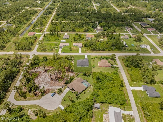 1061 Sunrise Blvd, Lehigh Acres, FL 33974 - drone / aerial view