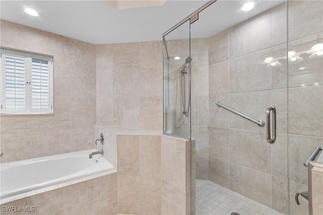 7120 Timberland Cir Unit 101, Naples, FL 34109 - full bath featuring a bath, a shower stall, and recessed lighting