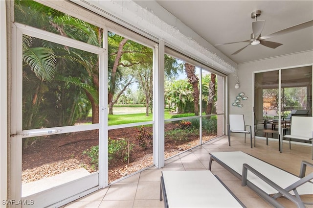7120 Timberland Cir Unit 101, Naples, FL 34109 - sunroom / solarium featuring a ceiling fan