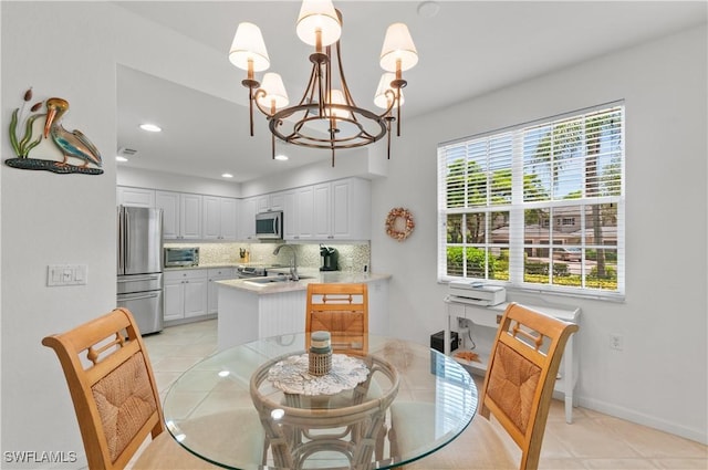 7120 Timberland Cir Unit 101, Naples, FL 34109 - dining room with a chandelier, light tile patterned floors, and recessed lighting