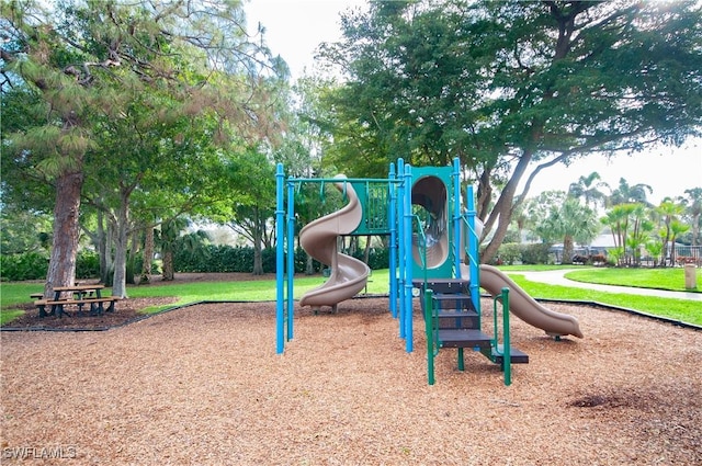 7120 Timberland Cir Unit 101, Naples, FL 34109 - community playground featuring a yard