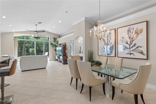 2434 Butterfly Palm Dr, Naples, FL 34119 - dining space featuring a chandelier, vaulted ceiling, crown molding, light tile patterned floors, and recessed lighting