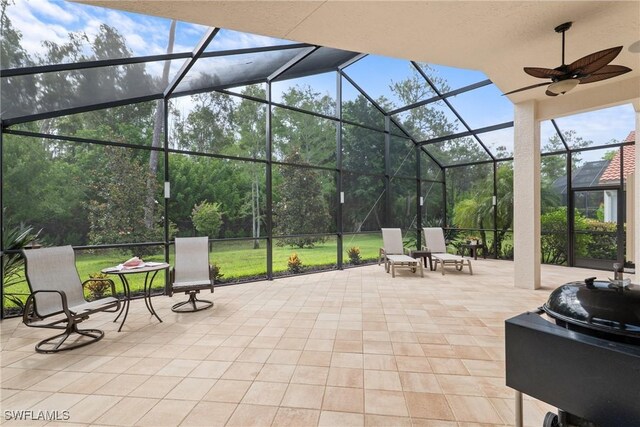2434 Butterfly Palm Dr, Naples, FL 34119 - view of patio with a lanai and ceiling fan