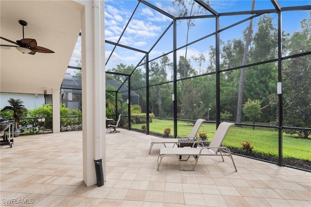 2434 Butterfly Palm Dr, Naples, FL 34119 - view of patio / terrace featuring glass enclosure and a ceiling fan