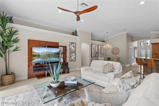 2434 Butterfly Palm Dr, Naples, FL 34119 - living area featuring arched walkways, a chandelier, a ceiling fan, ornamental molding, and recessed lighting