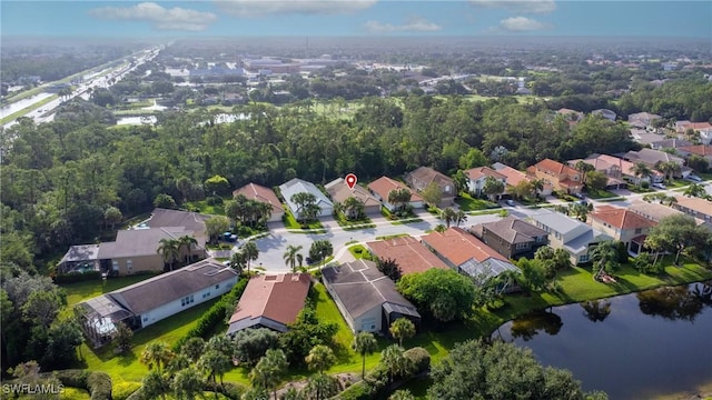 2434 Butterfly Palm Dr, Naples, FL 34119 - aerial overview of property's location with nearby suburban area and a nearby body of water