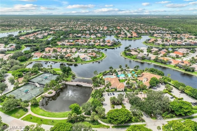 2434 Butterfly Palm Dr, Naples, FL 34119 - aerial overview of property's location featuring nearby suburban area and a large body of water